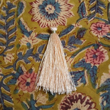 Pompon en coton rose poudré